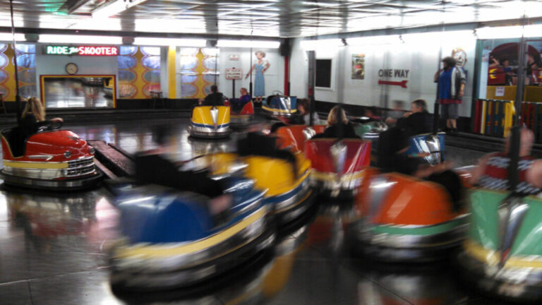 People riding the bumper cars in Seaside, Oregon