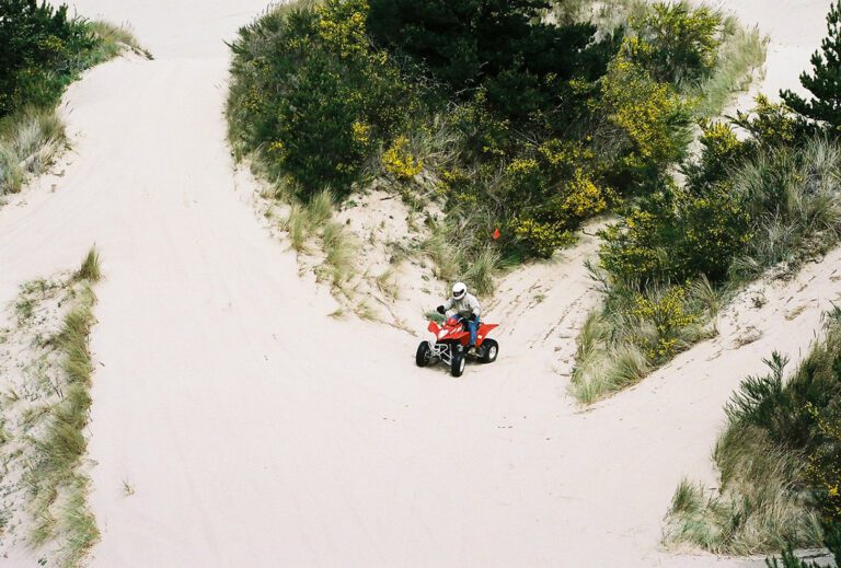 ATV riding on sand dunes at Honeyman State Park, Oregon Dunes near Florence Oregon
