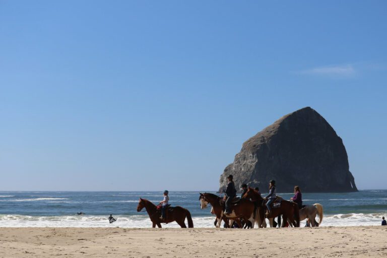 Horseback riding on the beach at Cape Kiwanda on the Oregon Coast