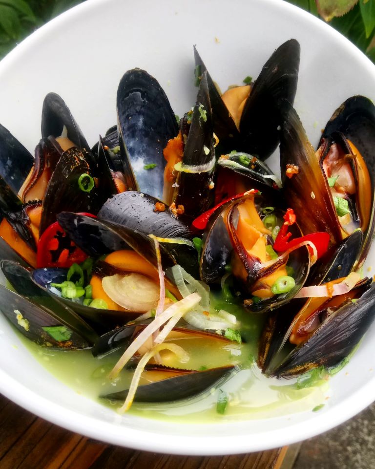 A dish of mussels at Ona Restaurant and lounge, one of the best restaurants in Yachats, Oregon