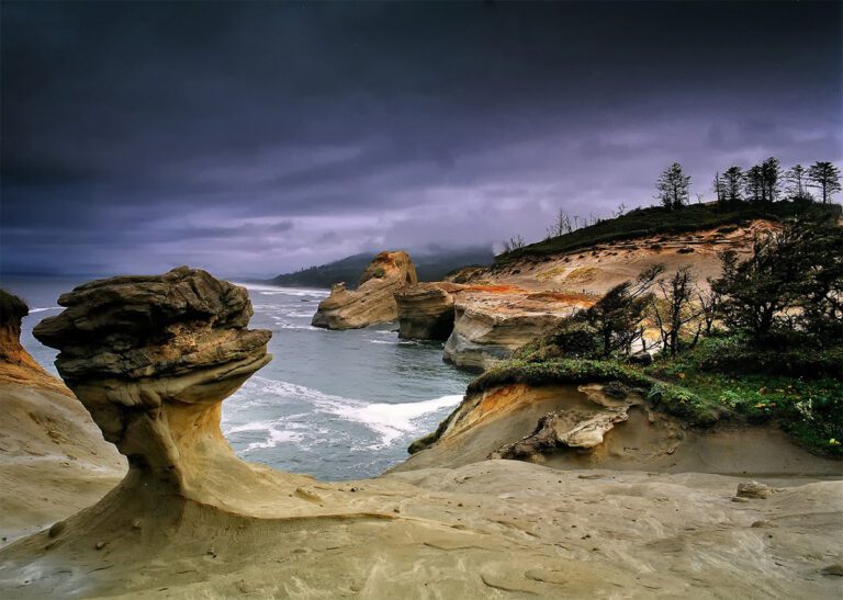 The dramatic sandstone rock formations as seen on a hike at Cape Kiwanda State Natural area in Pacific City, Oregon