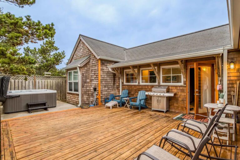 A beach house VRBO rental with a large back deck and hot tub in Pacific City, Oregon