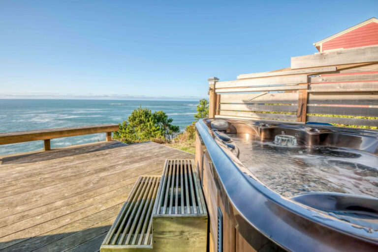 Private deck in Depoe Bay, Oregon overlooking the ocean with a hot tub