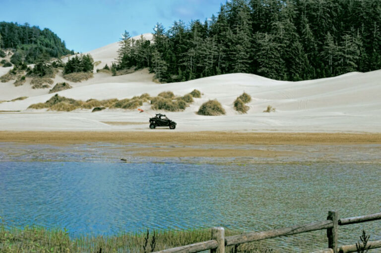 A dune buggy by the lake at Oregon Dunes Umpqua LIghthouse State Park