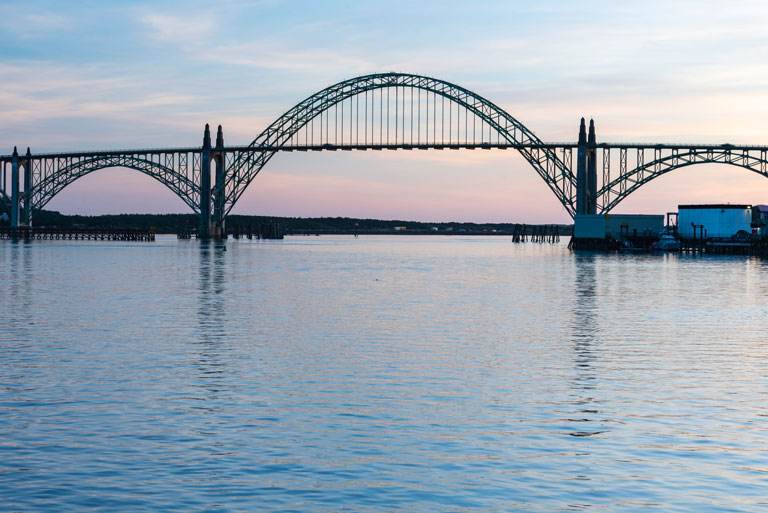 The Yaquina Bay bridge in Newport, Oregon at dusk