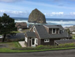 Exterior of a beach house cabin in Cannon Beach with a view of Haystack Rock at the Oregon Coast