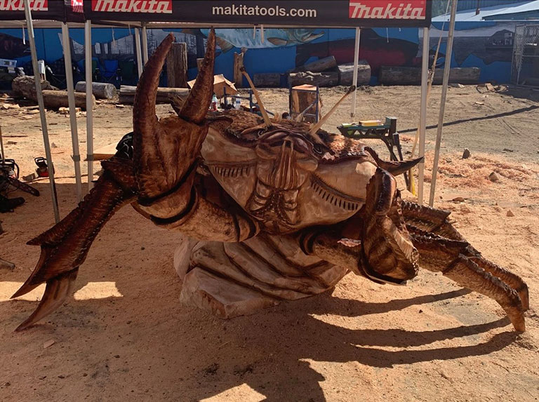 An intricate crab sculpture wins first place at the Oregon Divisional Chainsaw Carving Championship