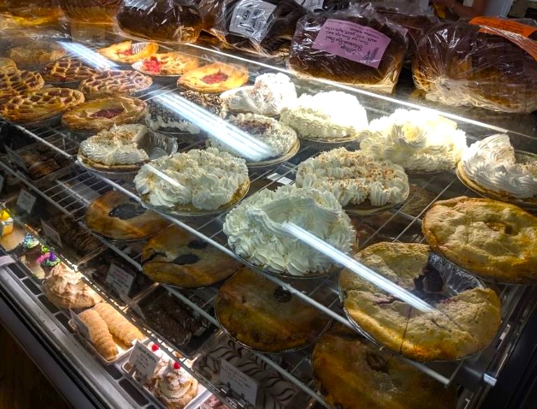 The baked goods case at Dylan's Cottage Bakery in Long Beach, Washington offers pies, cakes, cookies, donuts and pastries made from scratch.