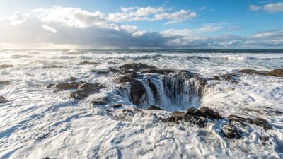 Thor's Well on the Oregon Coast near Yachats appears as a drain hole in the Pacific Ocean.